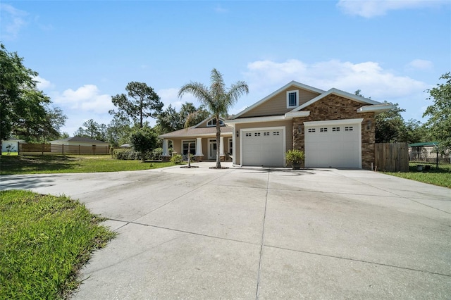 2948 W Henley Ln, Dunnellon, FL 34433 - view of front of house with concrete driveway and an attached garage