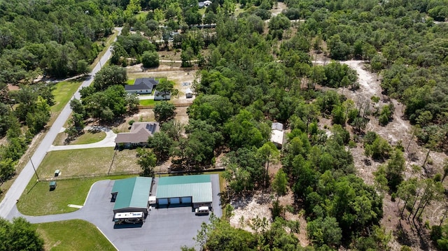 2948 W Henley Ln, Dunnellon, FL 34433 - aerial view of property and surrounding area featuring a heavily wooded area