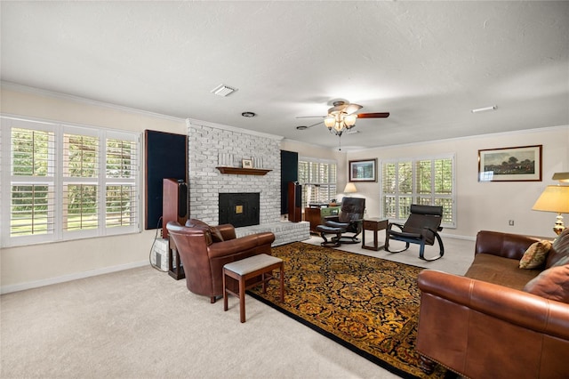 20861 SW 81st Loop, Dunnellon, FL 34431 - living area with a fireplace, healthy amount of natural light, ornamental molding, ceiling fan, and baseboards