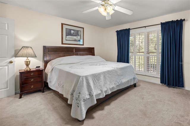 20861 SW 81st Loop, Dunnellon, FL 34431 - bedroom featuring carpet flooring, ceiling fan, and baseboards