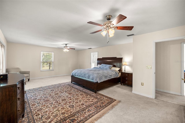 20861 SW 81st Loop, Dunnellon, FL 34431 - bedroom featuring carpet flooring, baseboards, and ceiling fan
