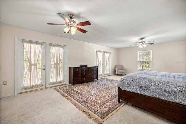 20861 SW 81st Loop, Dunnellon, FL 34431 - carpeted bedroom with french doors, access to exterior, and ceiling fan