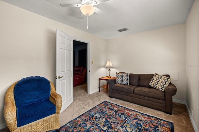 20861 SW 81st Loop, Dunnellon, FL 34431 - living room featuring carpet floors, a ceiling fan, and baseboards