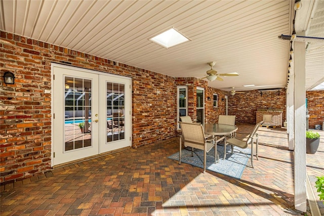 20861 SW 81st Loop, Dunnellon, FL 34431 - view of patio featuring french doors, ceiling fan, and outdoor dining space