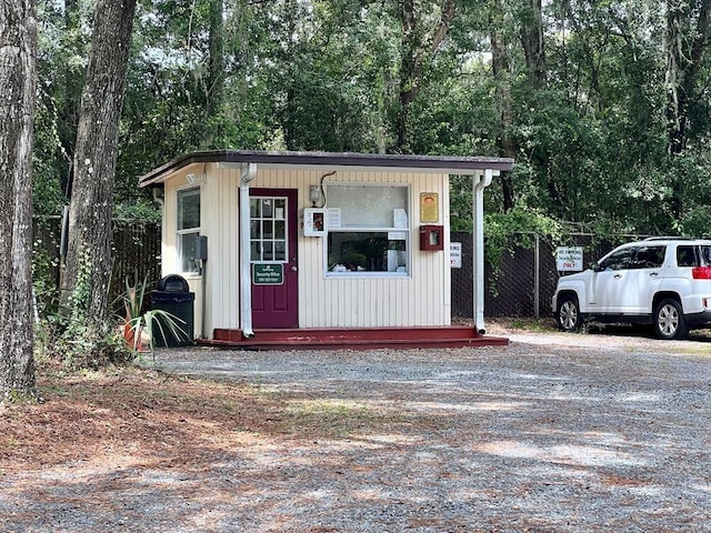 20861 SW 81st Loop, Dunnellon, FL 34431 - view of outbuilding with an outdoor structure and fence