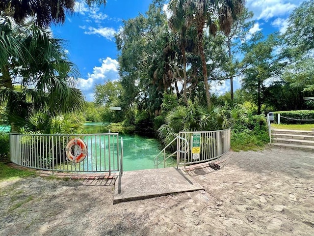 20861 SW 81st Loop, Dunnellon, FL 34431 - view of home's community featuring a water view and view of scattered trees