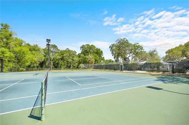 20861 SW 81st Loop, Dunnellon, FL 34431 - view of tennis court with community basketball court and fence