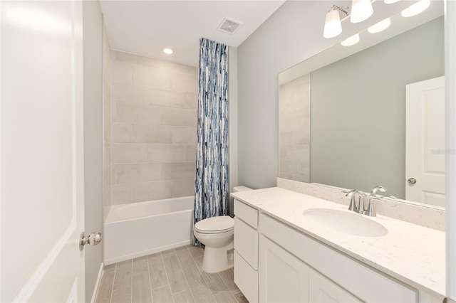1875 NW 44 Court Rd, Ocala, FL 34482 - full bathroom with toilet, shower / tub combo with curtain, vanity, and recessed lighting