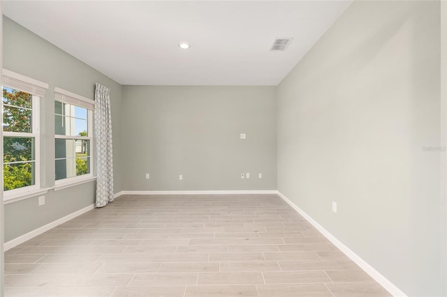 1875 NW 44 Court Rd, Ocala, FL 34482 - spare room with baseboards and recessed lighting