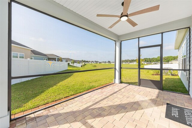 1875 NW 44 Court Rd, Ocala, FL 34482 - unfurnished sunroom featuring a ceiling fan