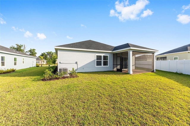 1875 NW 44 Court Rd, Ocala, FL 34482 - back of house featuring a sunroom and cooling unit