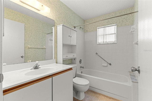 full bathroom with tub / shower combination, toilet, and vanity