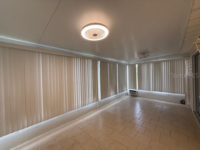 17522 SE 96th Ct, Summerfield, FL 34491 - unfurnished room with tile patterned flooring