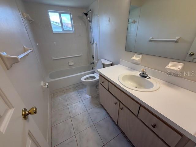 17522 SE 96th Ct, Summerfield, FL 34491 - full bathroom featuring vanity, shower / tub combination, and tile patterned flooring