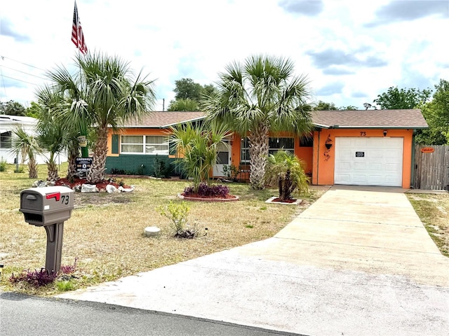 73 S Lincoln Ave, Beverly Hills, FL 34465 - view of front of home featuring an attached garage and driveway