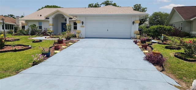 3891 N Grapefern Way, Beverly Hills, FL 34465 - view of front of property with concrete driveway, a front lawn, a garage, and stucco siding