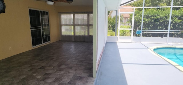 3891 N Grapefern Way, Beverly Hills, FL 34465 - view of swimming pool featuring a ceiling fan, a patio area, and glass enclosure