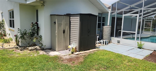 3891 N Grapefern Way, Beverly Hills, FL 34465 - view of home's exterior with stucco siding, an outdoor pool, glass enclosure, and a yard
