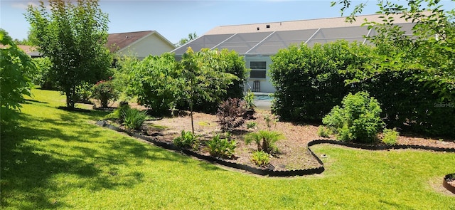3891 N Grapefern Way, Beverly Hills, FL 34465 - view of grassy yard featuring glass enclosure