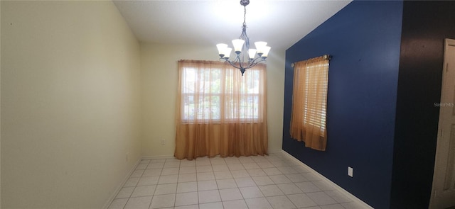3891 N Grapefern Way, Beverly Hills, FL 34465 - empty room with a chandelier, tile patterned flooring, and baseboards