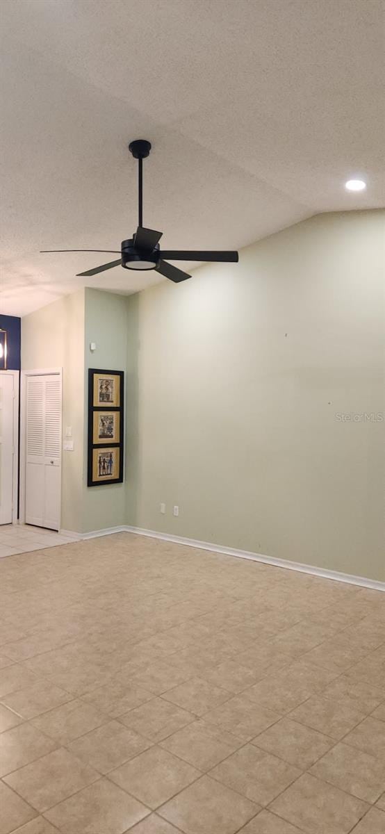 3891 N Grapefern Way, Beverly Hills, FL 34465 - empty room with a ceiling fan, a textured ceiling, baseboards, and recessed lighting
