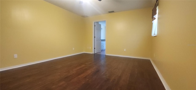 3891 N Grapefern Way, Beverly Hills, FL 34465 - spare room with ceiling fan, dark wood-type flooring, and baseboards