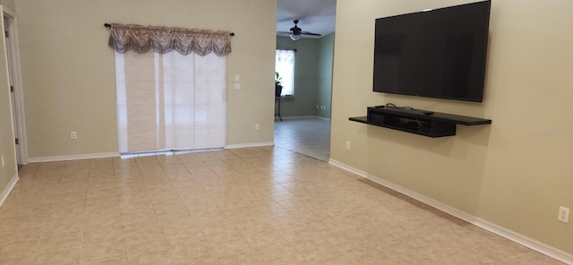 3891 N Grapefern Way, Beverly Hills, FL 34465 - unfurnished living room with ceiling fan and baseboards