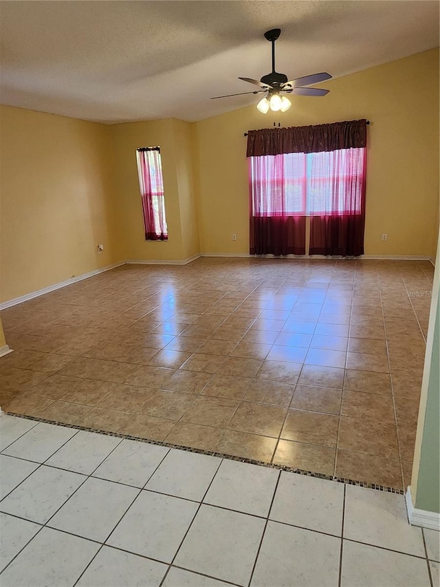 3891 N Grapefern Way, Beverly Hills, FL 34465 - tiled empty room with ceiling fan, baseboards, and a textured ceiling