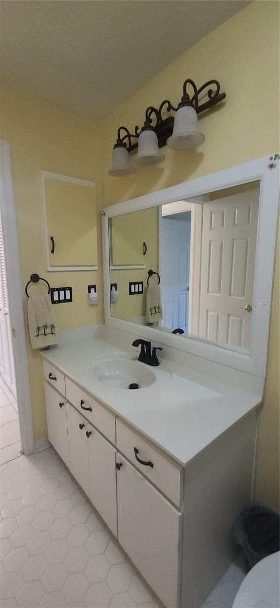 3891 N Grapefern Way, Beverly Hills, FL 34465 - bathroom featuring vanity, tile patterned floors, and toilet
