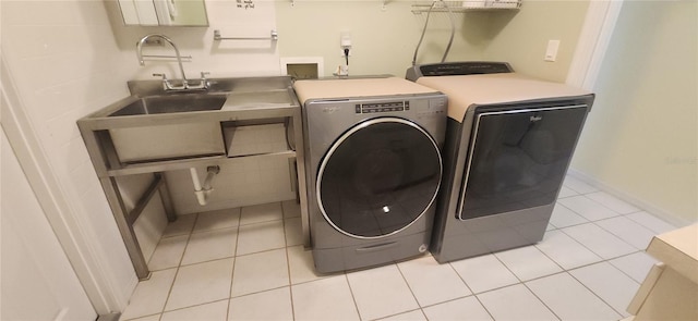 3891 N Grapefern Way, Beverly Hills, FL 34465 - laundry room with separate washer and dryer and light tile patterned flooring