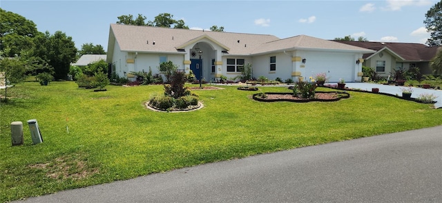 3891 N Grapefern Way, Beverly Hills, FL 34465 - ranch-style house featuring concrete driveway, a garage, and a front lawn