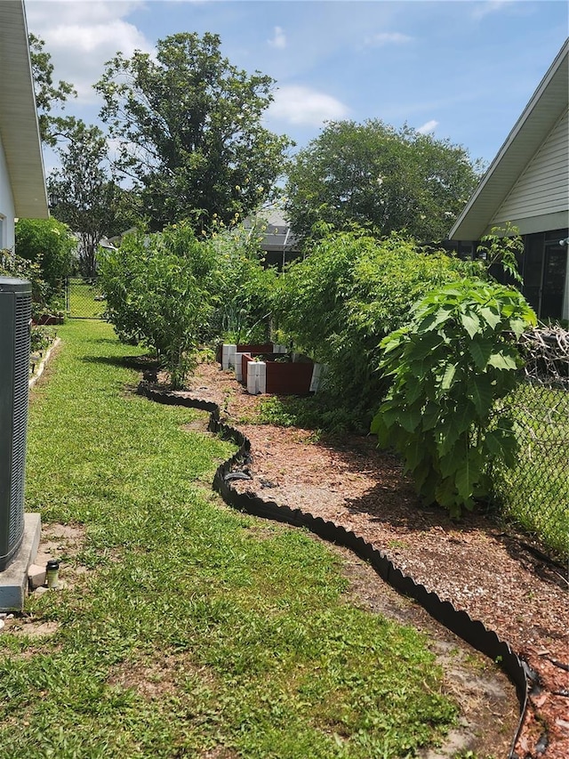 3891 N Grapefern Way, Beverly Hills, FL 34465 - view of yard with central air condition unit