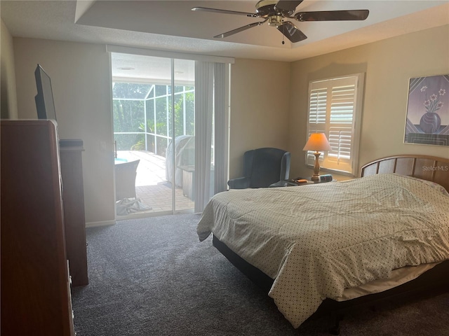 carpeted bedroom with access to outside, ceiling fan, and baseboards