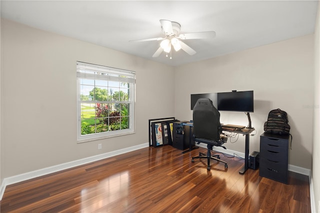 office space featuring baseboards, wood finished floors, and ceiling fan