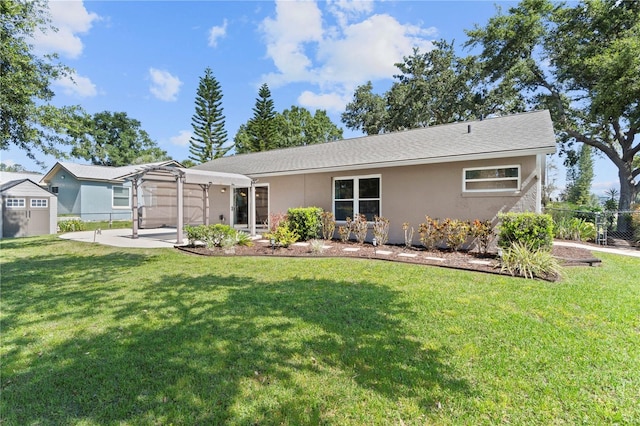 view of front of home with a pergola, a patio, and stucco siding