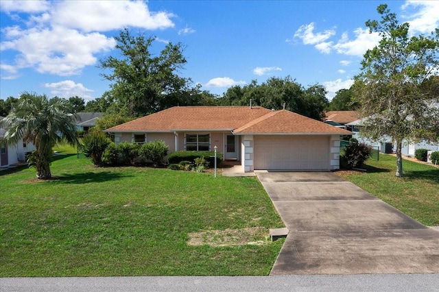 4992 NW 31st St, Ocala, FL 34482 - ranch-style house featuring an attached garage, a front yard, concrete driveway, and stucco siding