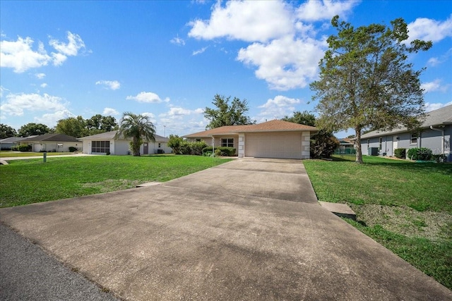 4992 NW 31st St, Ocala, FL 34482 - ranch-style home with a front yard, concrete driveway, and an attached garage