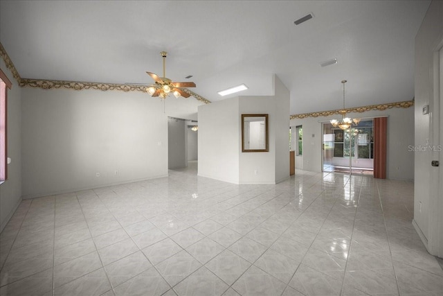 4992 NW 31st St, Ocala, FL 34482 - spare room with ceiling fan, light tile patterned flooring, vaulted ceiling, a chandelier, and baseboards