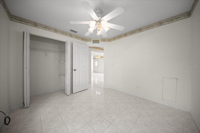 4992 NW 31st St, Ocala, FL 34482 - unfurnished bedroom featuring a closet, baseboards, and ceiling fan