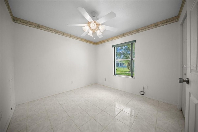 4992 NW 31st St, Ocala, FL 34482 - empty room featuring a ceiling fan and baseboards