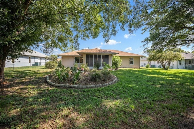 4992 NW 31st St, Ocala, FL 34482 - back of house with a sunroom and stucco siding