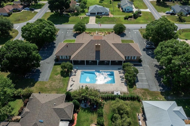 4992 NW 31st St, Ocala, FL 34482 - aerial view of property's location with a pool area and nearby suburban area
