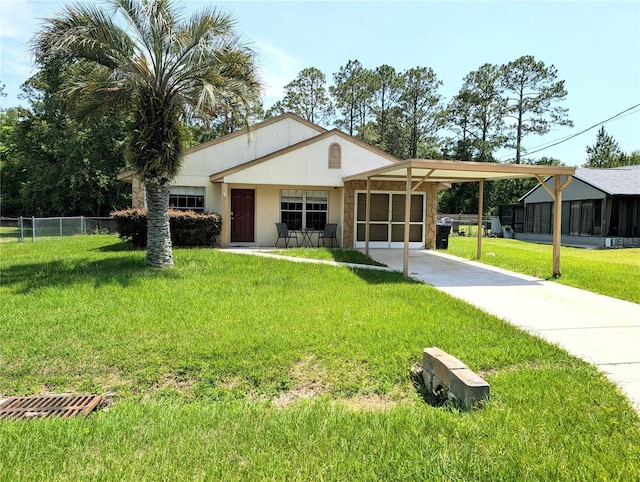 21298 SW Peach Blossom St, Dunnellon, FL 34431 - view of front of home featuring a garage, driveway, and stucco siding