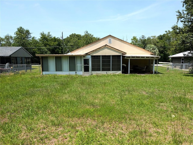 21298 SW Peach Blossom St, Dunnellon, FL 34431 - back of property featuring a sunroom