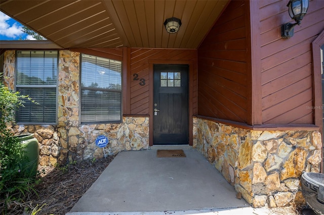 23 Larch Crse, Ocala, FL 34480 - property entrance with stone siding