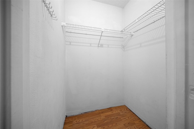 23 Larch Crse, Ocala, FL 34480 - spacious closet featuring wood finished floors