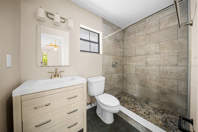 23 Larch Crse, Ocala, FL 34480 - bathroom featuring toilet, a tile shower, and vanity