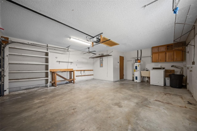 23 Larch Crse, Ocala, FL 34480 - garage with water heater, a workshop area, a garage door opener, washing machine and dryer, and electric panel
