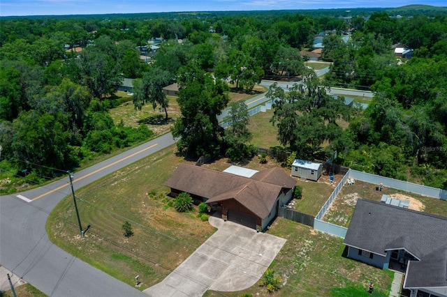 23 Larch Crse, Ocala, FL 34480 - aerial overview of property's location with a heavily wooded area