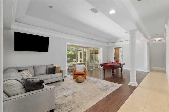 living area featuring ornate columns, pool table, recessed lighting, wood-type flooring, and ornamental molding